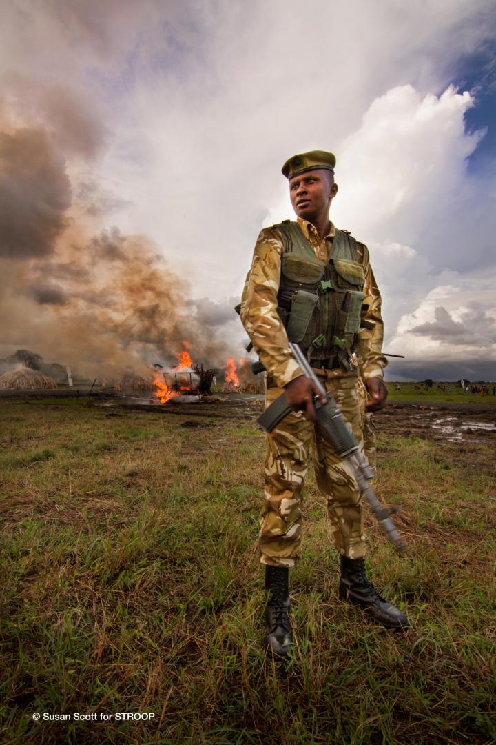 STROOP-Rhino-horn-stockpile-burn-guarded-by-Kenyan-ranger-Kenya